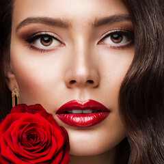 Fototapeta na wymiar Beauty Woman Face Red Lipstick Portrait with Rose. Fashion Model Girl Red Lips Make up. Luxury Skin Care Cosmetic and Makeup Close up