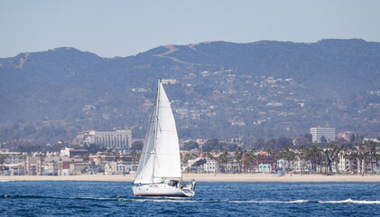View of the land in Southern California at Marina del Rey with the snow capped mountains in the...