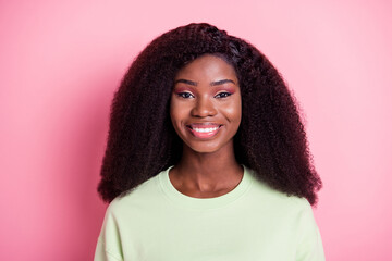 Photo of young beautiful charming positive good mood afro girl smiling wear sweater isolated on pink color background