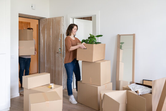 Young Couple Moving In New Flat