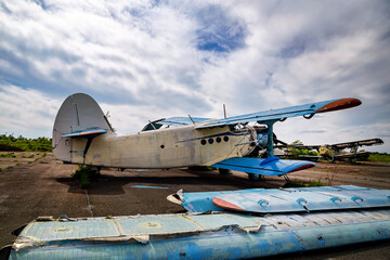 Abandoned planes old an-2 in the open air.