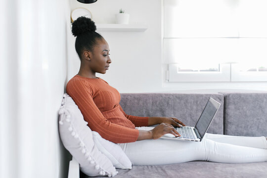 Young black woman working from home 