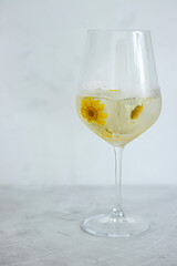 yellow flowers in a glass