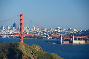 Golden Gate Bridge with blue sky and city of San Francisco