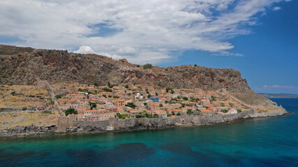 Fototapeta premium Aerial drone photo of new city of Monemvasia in the heart of Lakonia with beautiful clouds and deep blue sky, Peloponnese, Greece