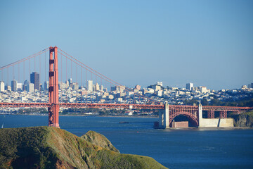 Golden Gate Bridge with blue sky and city of San Francisco