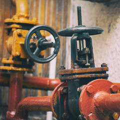 Industrial valve on a gas supply or heating system pipe. Selective Focus