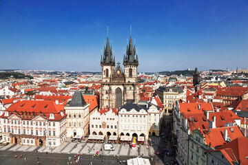 Fototapeta na wymiar Top view of the Old Town Square with the Church of the Virgin Mary in front of the Tyn and the surrounding historical buildings. Prague, Czech Republic