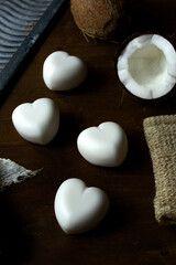 Fototapeta na wymiar Photos of coconut oil-based household soap in the shape of a heart