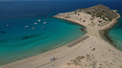 Aerial drone photo of beautiful sandy bay and double turquoise exotic beach of Simos resembling a blue lagoon in small island of Elafonisos, Lakonia, Peloponnese, Greece