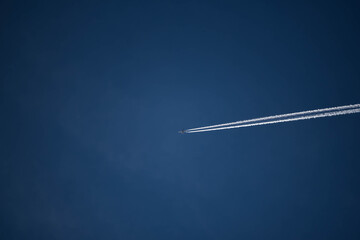 Photo of plane flying in blue sky,transportation
