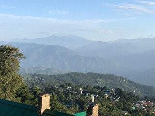 Fototapeta premium A picture of Himalayan mountains and valleys from a high point in the hill station of Dalhousie, in Himachal Pradesh of India.