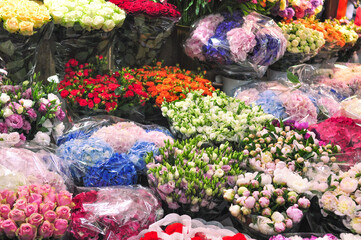 sale of bouquets of flowers in the subway passage