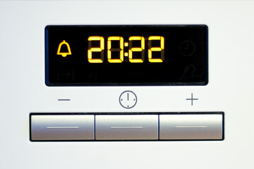 new year 2022. on the face of the clock time of 20 hours and 22 minutes. creative photo.