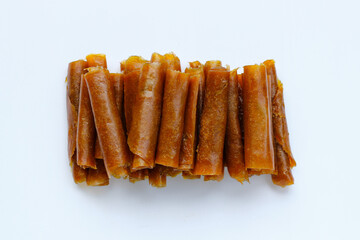 Dried mango paste on white background.
