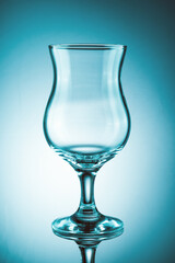Empty cocktail glass with reflection