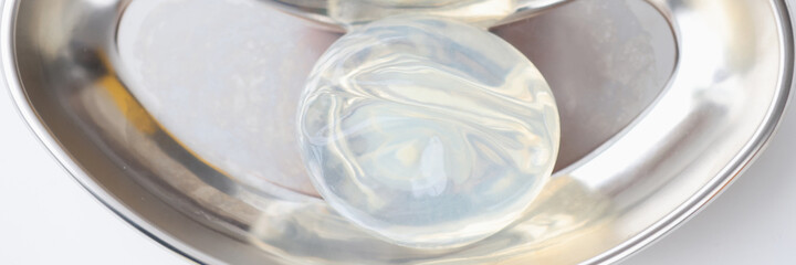 Silicone breast implant is in surgical plate
