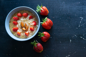 Fresh strawberry with oatmeal. Healthy habbits