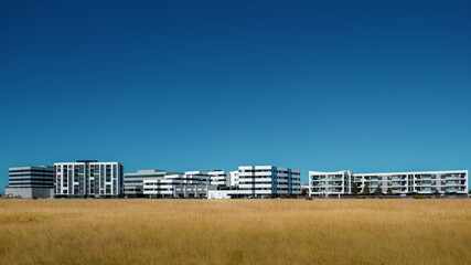 Beautiful modern new apartments at Williams Landing in Victoria, Australia under a blue sky