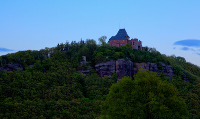 Fototapeta na wymiar Nideggen castle illuminated on a mountain, Germany.
