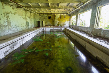 Abandoned school swimming pool in ghost town Pripyat Chornobyl Zone