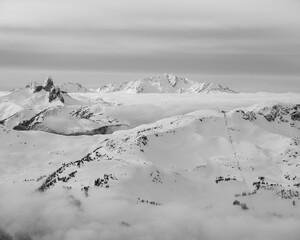 Harmony Chair on Whistler Mountain, British Columbia with Black Tusk and Tantalus Range in the...