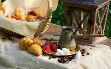 morning breakfast.Croissant,strawberries,and coffee.