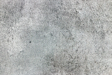 Textured gray concrete background.