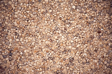 Small stones texture wall. Natural background
