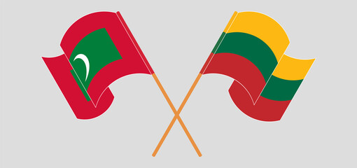 Crossed and waving flags of Maldives and Lithuania