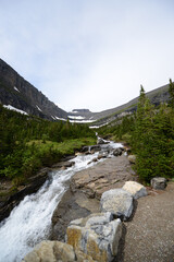 Waterfall and river at Glacier National Park, just off the Going to the Sun Road