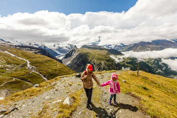 Fototapeta na wymiar tourist girls mother and daughter and mountain views