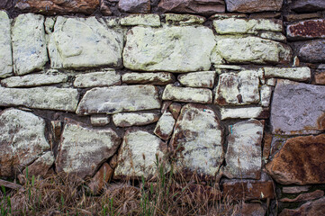 photo of an old stone wall. background. textures