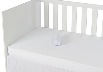White Baby Crib Isolated on White Background. Sheet Detail - obrazy, fototapety, plakaty