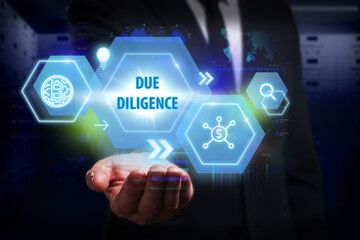 Business, Technology, Internet and network concept. Young businessman working on a virtual screen of the future and sees the inscription: Due diligence