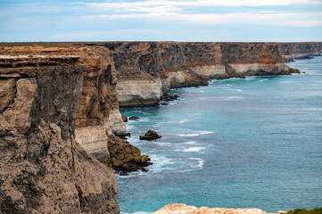 Fototapeta na wymiar The Bunda Cliffs stretch roughly 100 km along the Great Australian Bight. The cliffs formed when Australia separated from Antarctica approximately 65 million years ago.