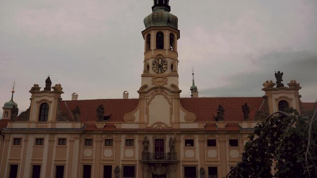Tilt-up motion, pov looking up, Loreta Monastery, Prague, historic Czech building