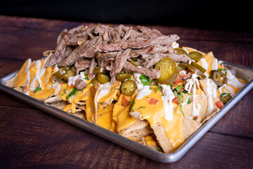 Exquisite nachos with meat and chiles