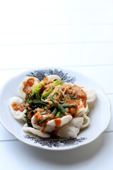 Kerupuk Pecel, Cracker Made from Tapioca Flour with Steamed Vegetable and Sambel Pecel