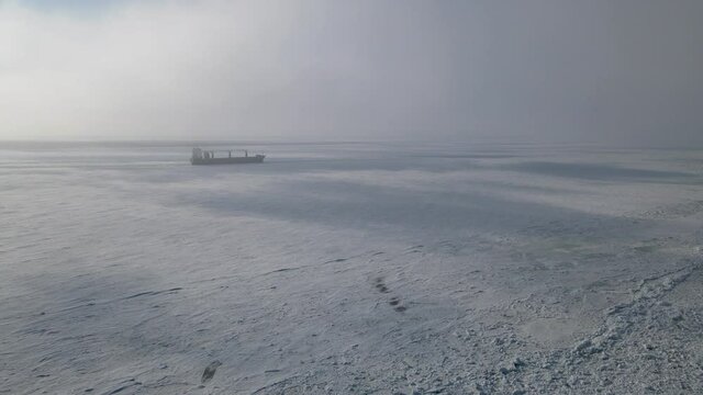 Seaship on frozen Yenisey. Dudinka, Taimyr, Dudinka