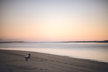 Fototapeta na wymiar Sunset on Karamea Estuary, West Coast, New Zealand