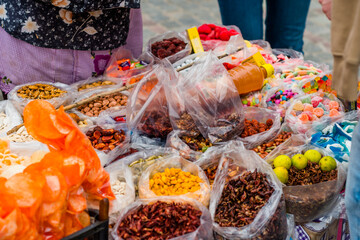 Mexican sweets and snacks in cart.