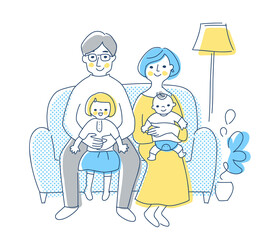 ソファに座っている4人家族