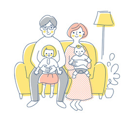 ソファに座っている4人家族