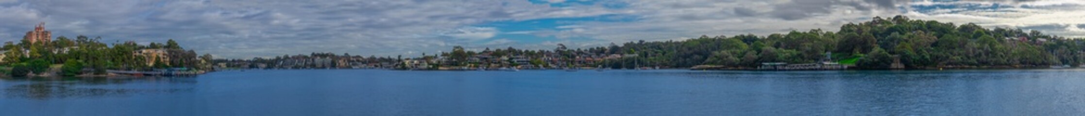 Fototapeta na wymiar Panorama view of Parramatta river residential properties at Gladesville on Sydney harbour foreshore NSW Australia 