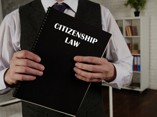  CITIZENSHIP LAW book in the hands of a lawyer. Citizenship law is the&nbsp;law&nbsp;of a sovereign state, and of each of its jurisdictions