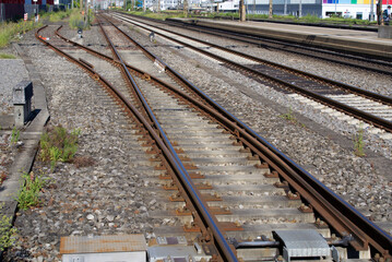 Close-up of railway switch st train station Zurich Schlieren at a beautiful summer day. Photo taken June 15th, 2021, Schlieren, Switzerland.