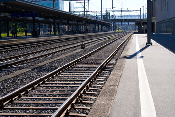 Train station Schlieren Canton Zurich with backlight on a beautiful summer day. Photo taken June...
