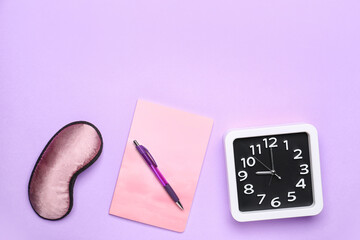 Composition with stylish clock and notebook on color background
