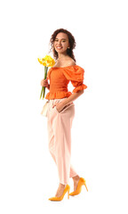 Beautiful young African-American woman with narcissus bouquet on white background